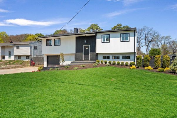 Attached, Exterior, Facade, Brick Facade, Raised Ranch