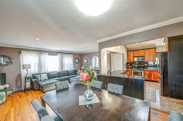 Dining room, Interior, Kitchen, Living room, Recessed Lighting, Stainless Steel Appliances, Wood Texture Flooring