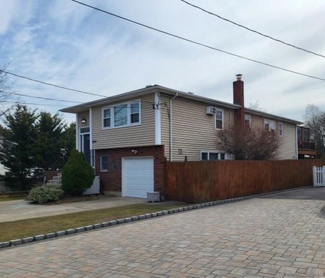 Attached, Exterior, Facade, Brick Facade, Raised Ranch