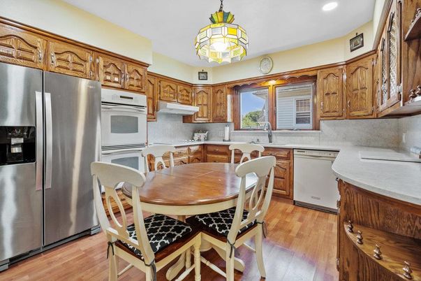 Dining room, Interior, Kitchen, Recessed Lighting, Stainless Steel Appliances, Wood Texture Flooring