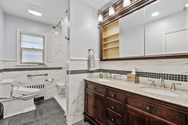 Bathroom, Dual Sink Vanities, Interior, Marble Walls, Recessed Lighting