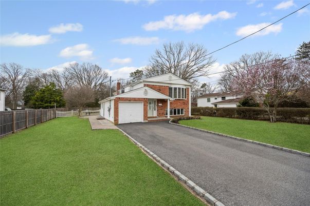 Attached, Backyard, Exterior, Facade, Brick Facade, None