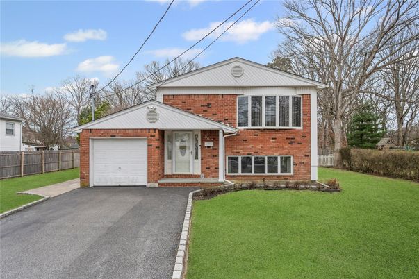 Attached, Exterior, Facade, Brick Facade, Raised Ranch