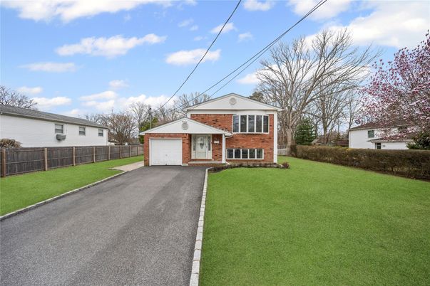 Attached, Backyard, Exterior, Facade, Brick Facade, None