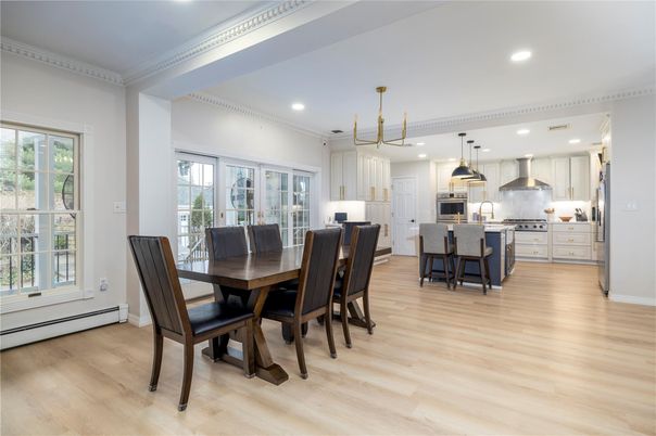 Dining room, Interior, Kitchen, Pendant Lights, Recessed Lighting, Stainless Steel Appliances, Wood Texture Flooring