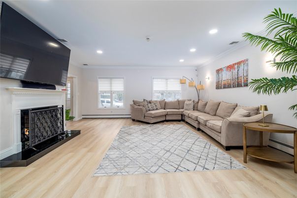 Fireplace, Interior, Living room, Recessed Lighting, Wood Texture Flooring