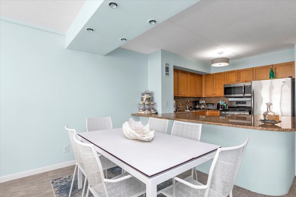 Dining room, Interior, Kitchen, Recessed Lighting, Stainless Steel Appliances, Wood Texture Flooring