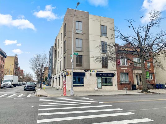 Exterior, Facade, Brick Facade, Condo Building