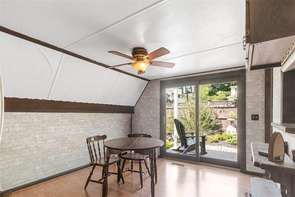 Dining room, Fireplace, Interior, Stone Walls, Wood Texture Flooring
