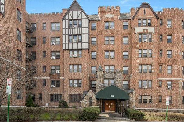 Exterior, Facade, Brick Facade, Condo Building
