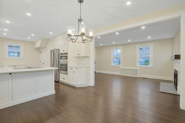Chandelier, Fireplace, Interior, Kitchen, Pendant Lights, Recessed Lighting, Stainless Steel Appliances, Wood Texture Flooring