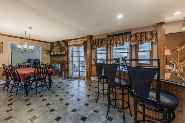 Chandelier, Dining room, Fireplace, Interior, Recessed Lighting, Stone Walls