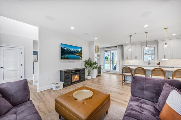 Fireplace, Interior, Kitchen, Living room, Pendant Lights, Recessed Lighting, Wood Texture Flooring