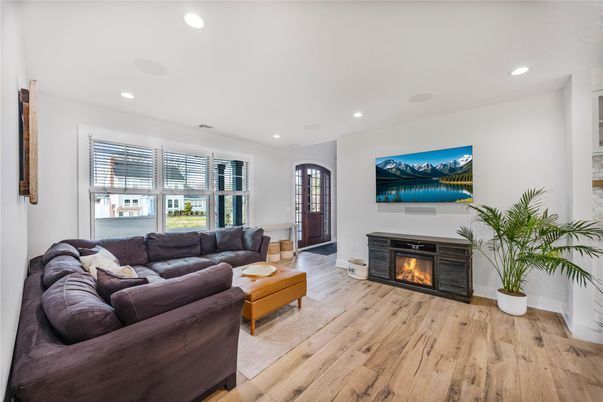 Fireplace, Interior, Living room, Recessed Lighting, Wood Texture Flooring