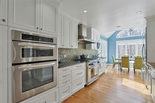Dining room, Interior, Kitchen, Recessed Lighting, Stainless Steel Appliances, Wood Texture Flooring