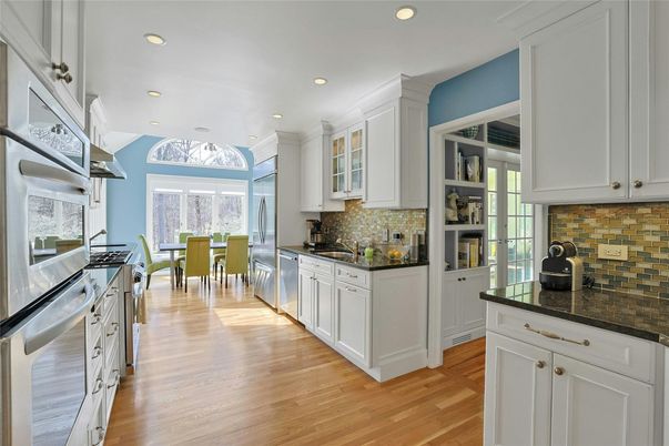 Dining room, Interior, Kitchen, Recessed Lighting, Stainless Steel Appliances, Wood Texture Flooring