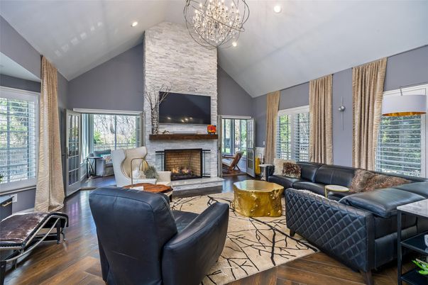 Fireplace, Interior, Living room, Recessed Lighting, Stone Walls, Wood Texture Flooring