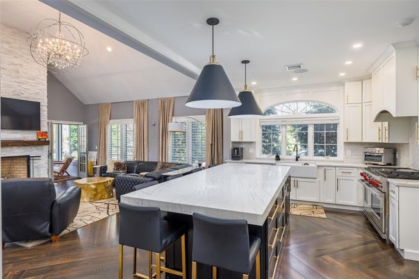Fireplace, Interior, Kitchen, Living room, Pendant Lights, Recessed Lighting, Stainless Steel Appliances, Wood Texture Flooring
