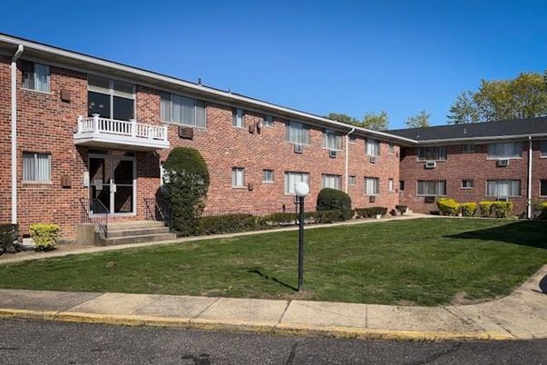 Exterior, Facade, Brick Facade, Condo Building