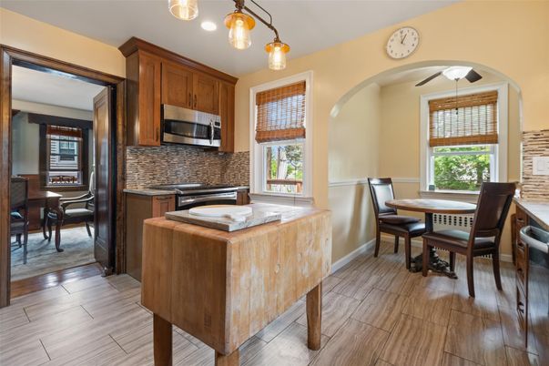 Dining room, Interior, Kitchen, Pendant Lights, Stainless Steel Appliances, Wood Texture Flooring