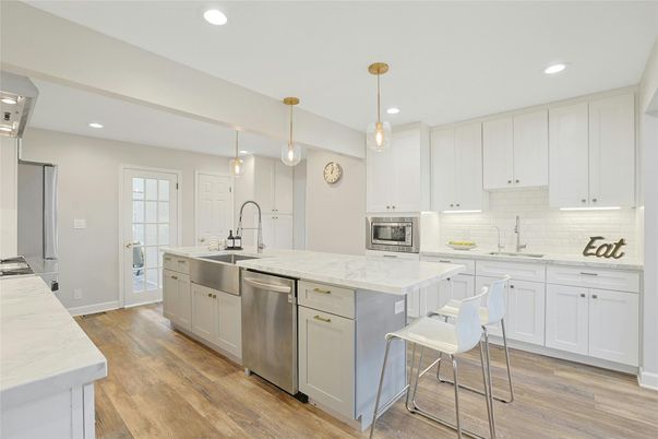 Interior, Kitchen, Pendant Lights, Recessed Lighting, Stainless Steel Appliances, Wood Texture Flooring