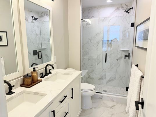 Bathroom, Dual Sink Vanities, Glass Shower, Interior, Marble, Marble Walls, Recessed Lighting