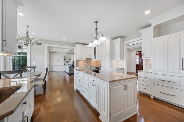 Chandelier, Dining room, Interior, Kitchen, Pendant Lights, Recessed Lighting, Stainless Steel Appliances, Wood Texture Flooring