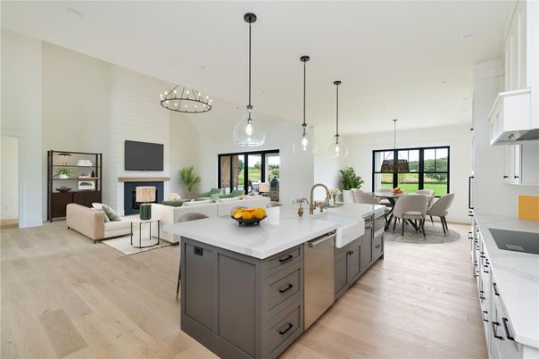 Chandelier, Dining room, Fireplace, Interior, Kitchen, Living room, Pendant Lights, Stainless Steel Appliances, Wood Texture Flooring