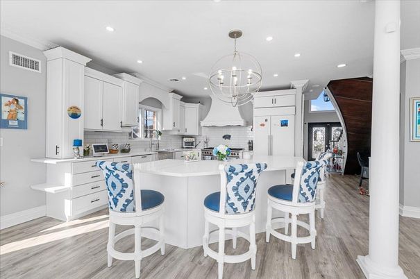 Chandelier, Interior, Kitchen, Pendant Lights, Recessed Lighting, Stainless Steel Appliances, Wood Texture Flooring