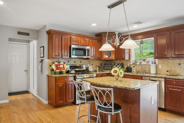 Interior, Kitchen, Pendant Lights, Recessed Lighting, Stainless Steel Appliances, Wood Texture Flooring