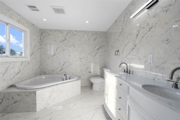 Bathroom, Dual Sink Vanities, Interior, Marble, Marble Walls, Recessed Lighting