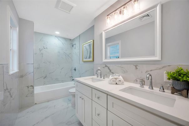 Bathroom, Dual Sink Vanities, Interior, Marble, Marble Walls, Recessed Lighting