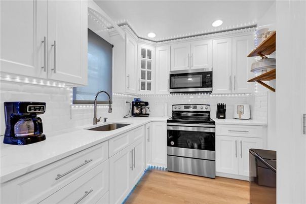 Interior, Kitchen, Recessed Lighting, Stainless Steel Appliances, Wood Texture Flooring