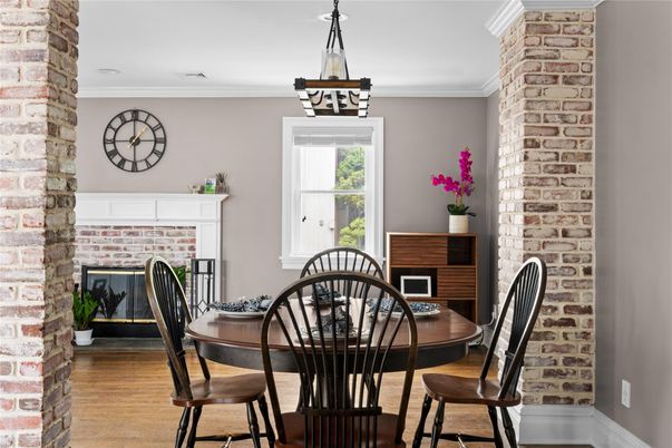 Dining room, Fireplace, Interior, Pendant Lights, Stone Walls, Wood Texture Flooring