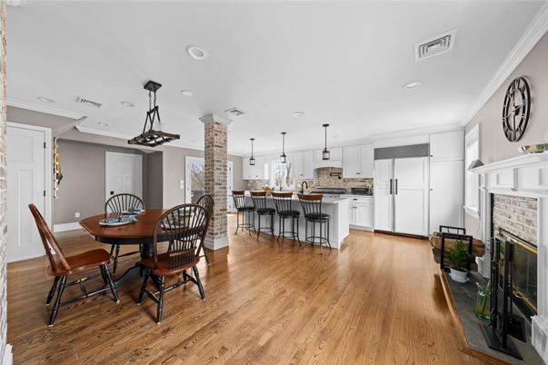 Dining room, Fireplace, Interior, Kitchen, Pendant Lights, Recessed Lighting, Stone Walls, Wood Texture Flooring