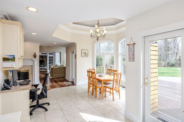 Chandelier, Dining room, Fireplace, Interior, Living room, Recessed Lighting, Wood Texture Flooring
