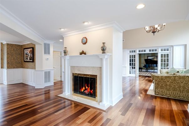 Chandelier, Fireplace, Interior, Living room, Piano, Recessed Lighting, Wood Texture Flooring
