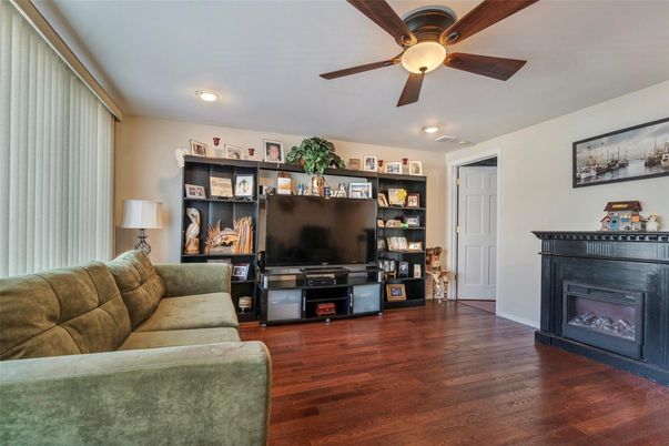 Fireplace, Interior, Living room, Recessed Lighting, Wood Texture Flooring