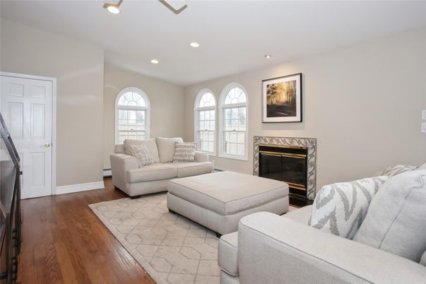 Fireplace, Interior, Living room, Recessed Lighting, Wood Texture Flooring