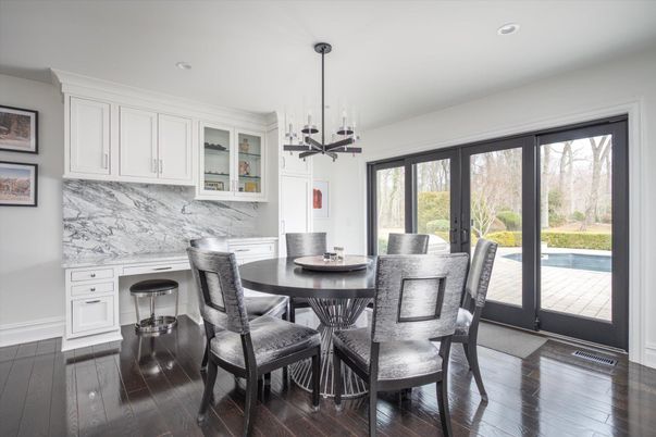 Dining room, Interior, Marble Walls, Pendant Lights, Recessed Lighting, Wood Texture Flooring
