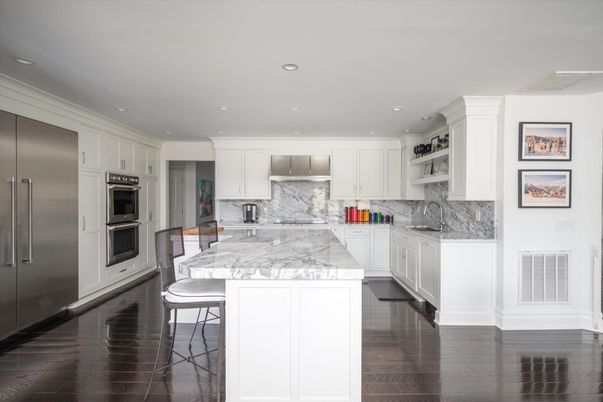 Interior, Kitchen, Marble Walls, Recessed Lighting, Stainless Steel Appliances, Wood Texture Flooring