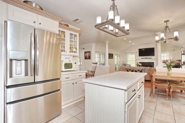 Chandelier, Dining room, Fireplace, Interior, Kitchen, Pendant Lights, Recessed Lighting, Stainless Steel Appliances