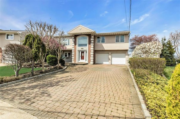 Attached, Exterior, Facade, Raised Ranch