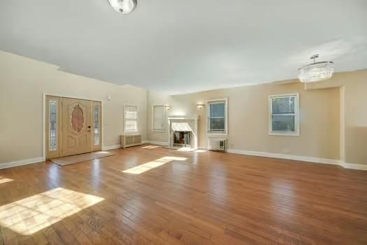 Chandelier, Empty room, Fireplace, Interior, Wood Texture Flooring