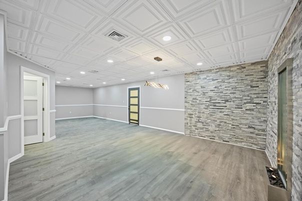 Empty room, Interior, Pendant Lights, Recessed Lighting, Stone Walls, Wood Texture Flooring