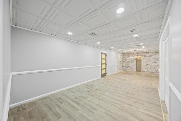 Empty room, Interior, Recessed Lighting, Stone Walls, Wood Texture Flooring