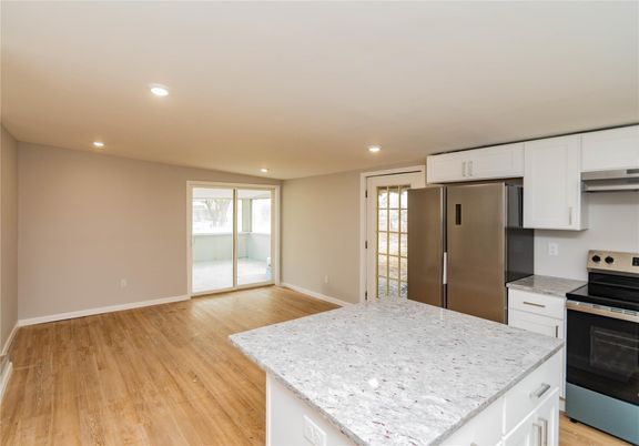 Interior, Kitchen, Recessed Lighting, Stainless Steel Appliances, Wood Texture Flooring