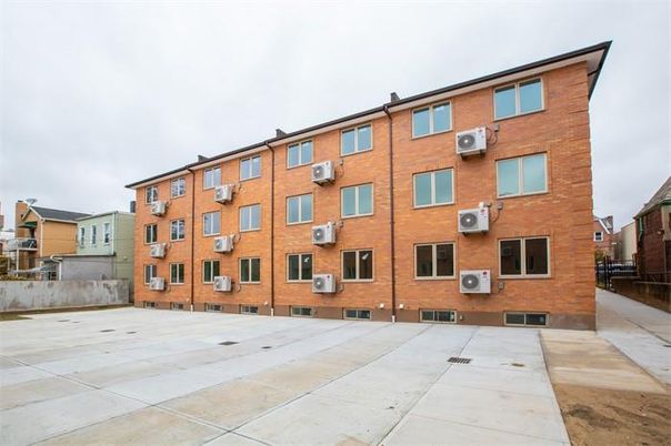 Exterior, Facade, Brick Facade, Condo Building