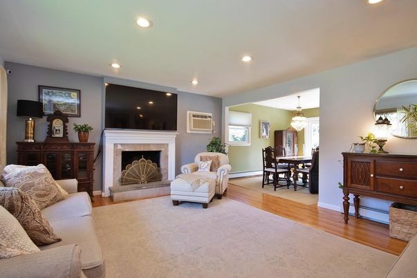 Chandelier, Dining room, Fireplace, Interior, Living room, Pendant Lights, Recessed Lighting, Wood Texture Flooring