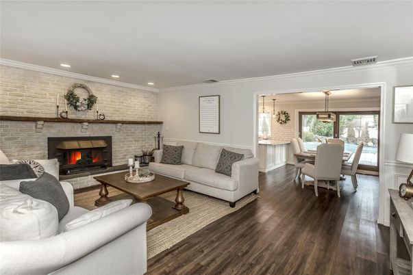 Dining room, Fireplace, Interior, Living room, Pendant Lights, Recessed Lighting, Stone Walls, Wood Texture Flooring